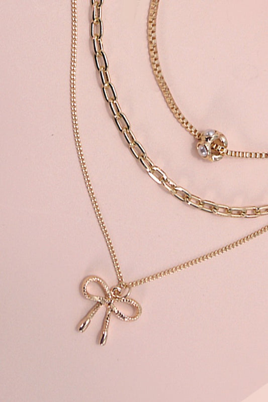 MULTI LAYER PEARL BOW CHARM NECKLACE